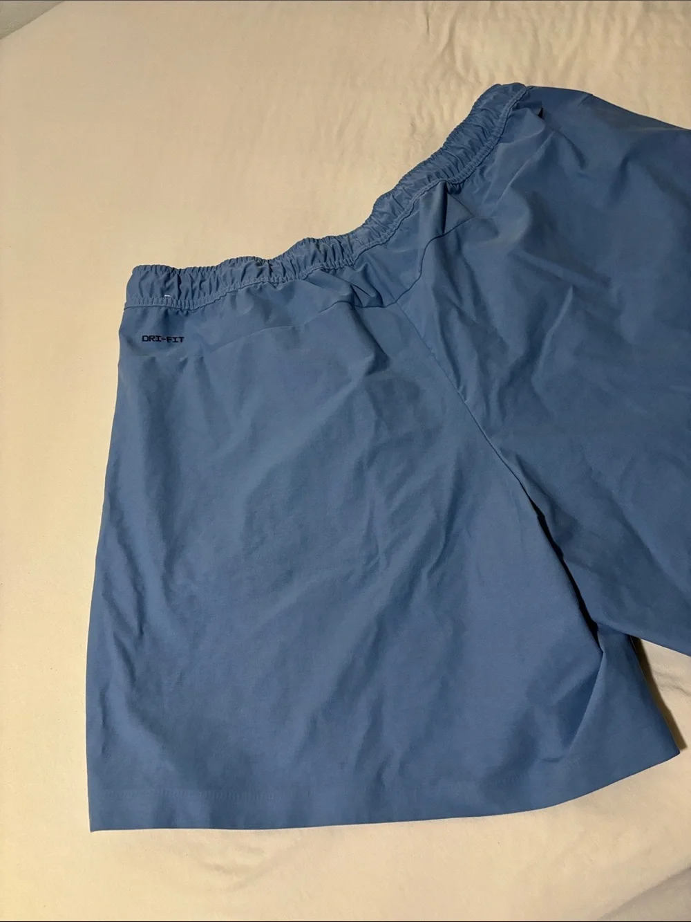 Nike Men’s Blue Swim Trunks with Black Trim